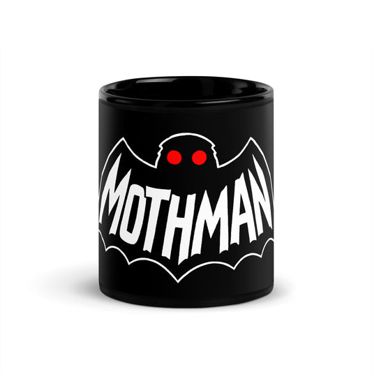 Mothman cryptid coffee mug with glowing red eyes and distressed paranormal typography on black ceramic mug