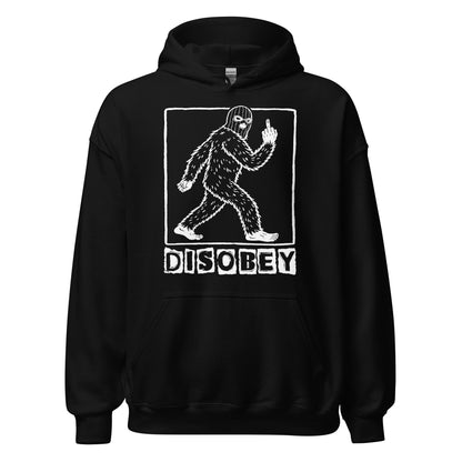 Disobey Sasquatch hoodie on black featuring walking Bigfoot silhouette with rebellious gesture