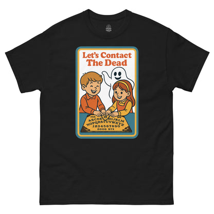 Vintage occult parody T-shirt with cartoon kids using ouija board, retro 70s children’s book cover style, by strangeandtwisted.com