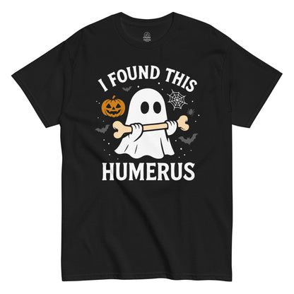Strange & Twisted black T-shirt with I Found This Humerus ghost parody design featuring bone, pumpkin, bats, and spider web