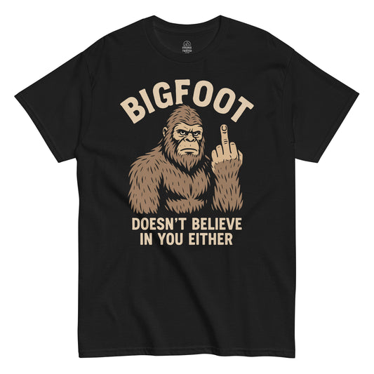 Bigfoot parody T-shirt on black – Sasquatch flipping the middle finger with “Doesn’t Believe in You Either” text