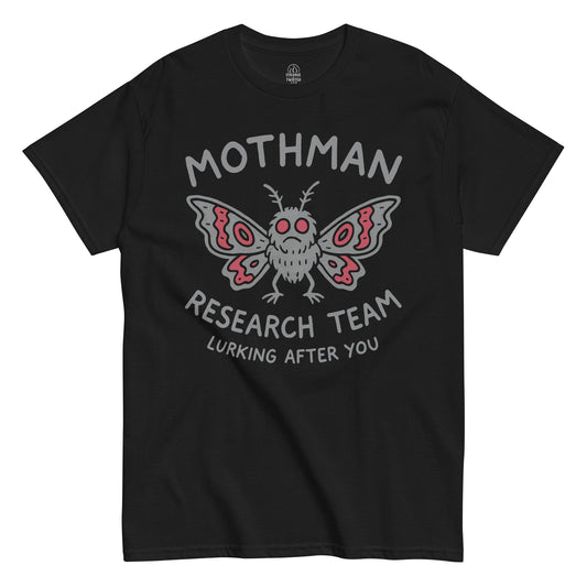 Mothman Research Team T-shirt on black, red-eyed cryptid with “Lurking After You” text for cryptid and folklore fans