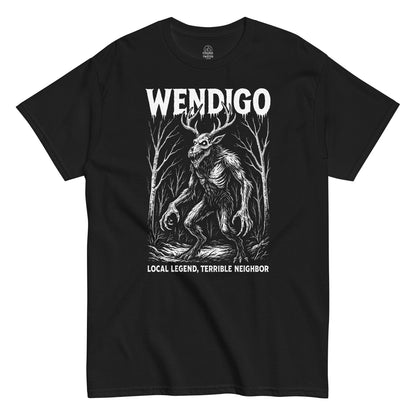 Wendigo cryptid T-shirt on black background, white illustration of antlered forest monster with text “Local Legend, Terrible Neighbor,” horror folklore apparel