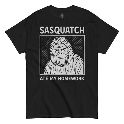 Black Sasquatch Ate My Homework T-shirt featuring funny Bigfoot illustration, humorous cryptid apparel by Strange and Twisted