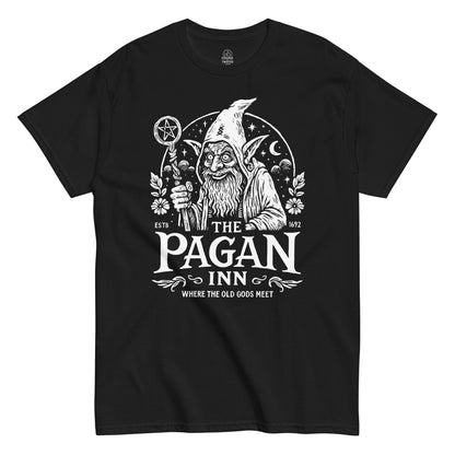 The Pagan Inn T-shirt featuring a white hand-drawn wizard holding a pentacle staff, surrounded by stars, flowers, and crescent moon on black background.
