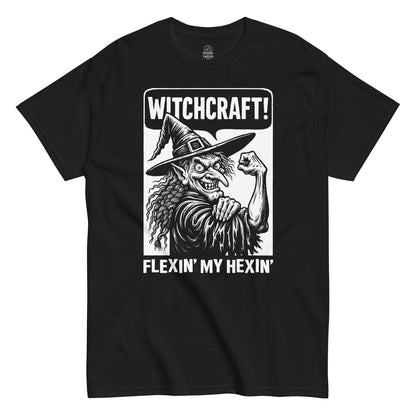 Black t-shirt with a graphic of a witch and text 'Witchcraft! Flexin' My Hexin'' on a white background