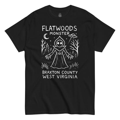 Flatwoods Monster T-shirt featuring eerie cryptid with UFO and moonlight on black fabric.