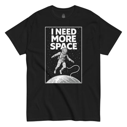 Front black t-shirt showing I Need More Space astronaut floating in space graphic