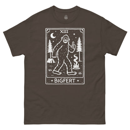 Brown t-shirt with a graphic of a Bigfoot-like creature and 'BIGFERT' text on a white background