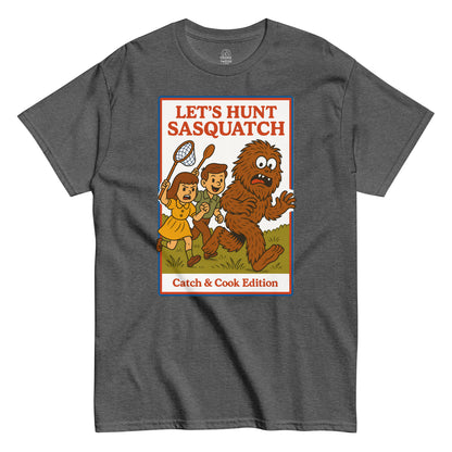 Grey Let’s Hunt Sasquatch Retro Parody T-Shirt front view, funny Bigfoot retro cryptid design, By strangeandtwisted.com