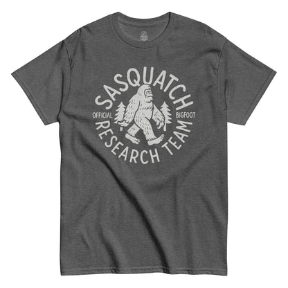 Sasquatch Research Team T-shirt with dark print of Bigfoot research logo on heather grey fabric.