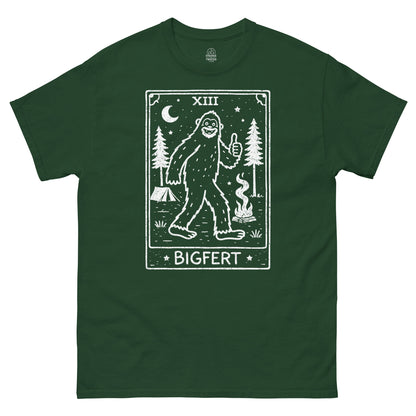 Green t-shirt with a graphic of the cryptid bigfoot and the word 'BIGFERT' on a white background