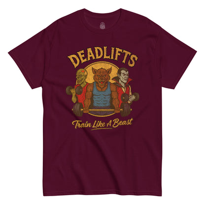 Funny gym T-shirt featuring werewolf, zombie, and vampire lifting weights with text “Deadlifts Train Like A Beast,” printed with a worn vintage texture.