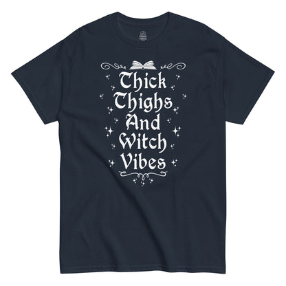 Strange And Twisted navy T-shirt featuring Thick Thighs And Witch Vibes witchcraft humour design with gothic script