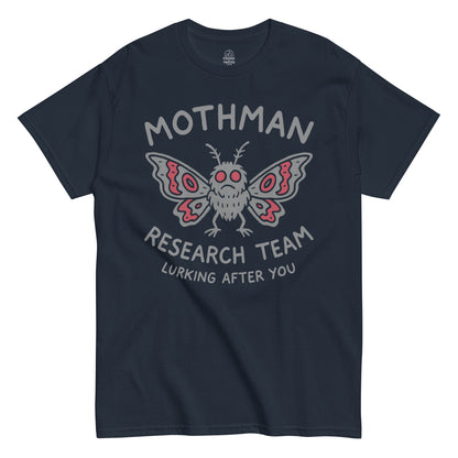 Mothman Research Team T-shirt on navy background, featuring red-eyed Mothman and “Lurking After You” slogan, ideal for urban legend and cryptid fans