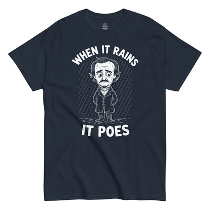 When It Rains It Poes Edgar Allan Poe T-shirt featuring white cartoon Poe artwork on navy fabric.