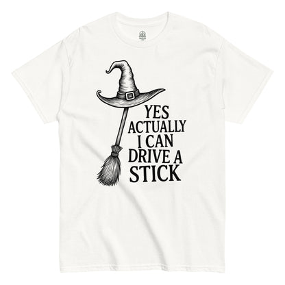 Strange & Twisted white T-shirt featuring Yes Actually I Can Drive A Stick witch parody design with broomstick silhouette