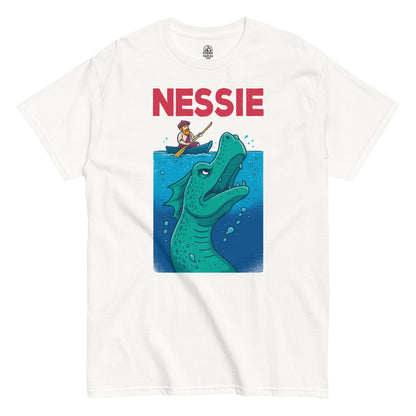 White Nessie T-shirt featuring cartoon Loch Ness Monster and Scottish man in rowboat, funny Scottish folklore apparel by Strange and Twisted