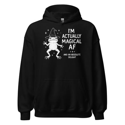 Black hoodie with white magical frog illustration wearing a witch hat and text saying Magical AF, By Strange & Twisted