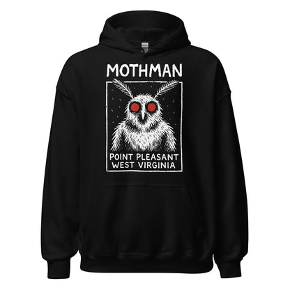 Black unisex hoodie featuring bold white Mothman Point Pleasant West Virginia cryptid artwork with glowing red eyes, classic folklore style, By Strange & Twisted