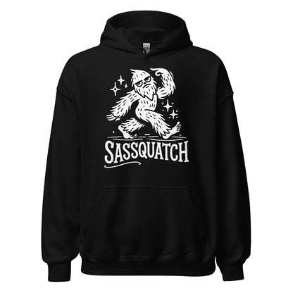 Black hoodie featuring a white cartoon Sasquatch striking a confident pose with sparkles and the word Sassquatch beneath.