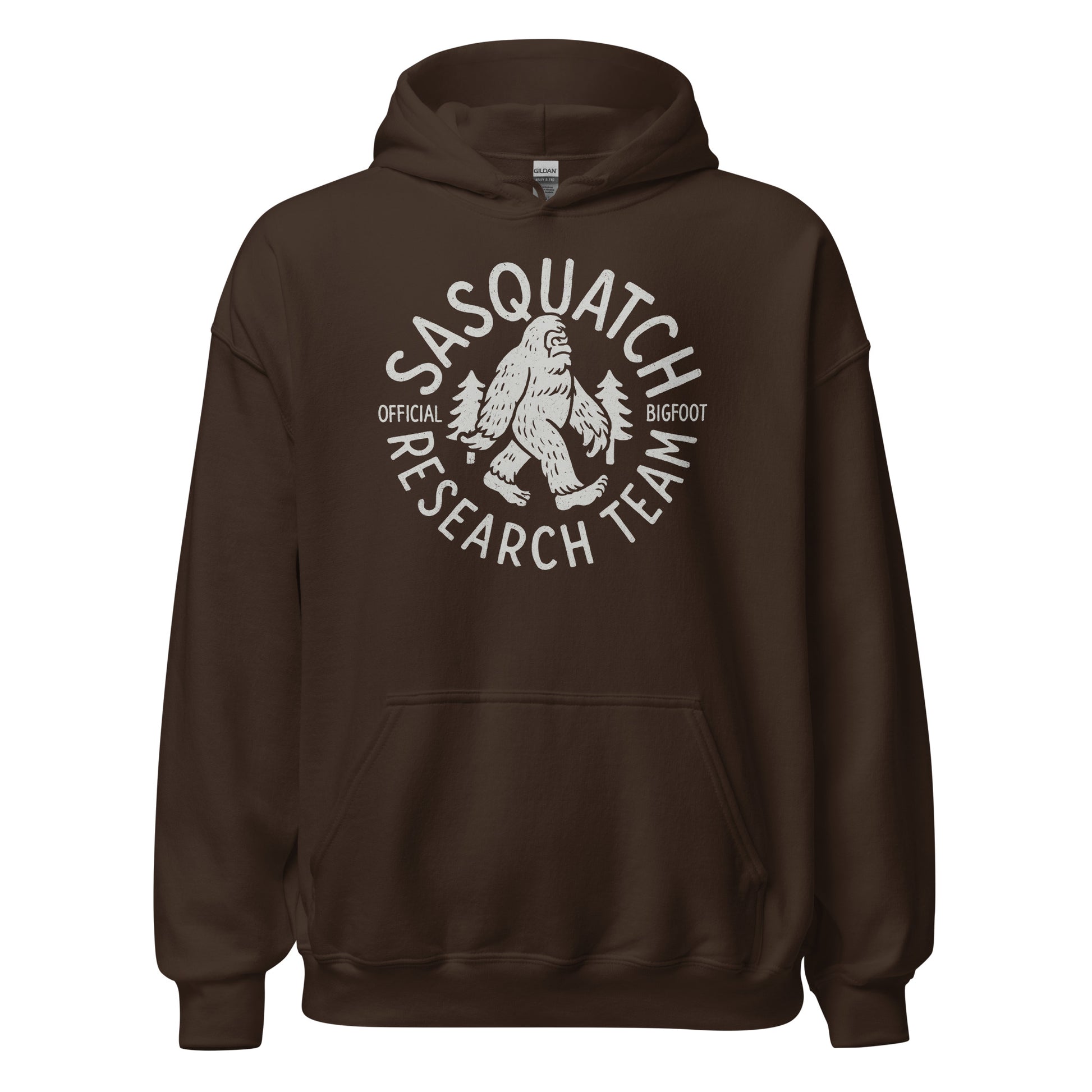 Dark chocolate brown hoodie with Sasquatch Research Team emblem in light grey, Bigfoot walking between trees, circular cryptid badge, By Strange & Twisted